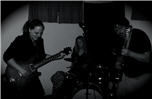 Heather, Dave and an unnamed drummer get down in black and white - 07/21/06