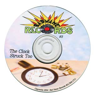 The Clock Struck Too - it's a picture of a hammer striking a clock and a broken door handle flies out